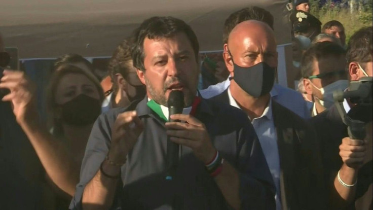 IMAGESProtesters throw water at Italian far-right leader Matteo Salvini as he arrives to a council estate in Mondragone, where a cluster of coronavirus cases among Bulgarian farm workers has fueled tension with locals.
