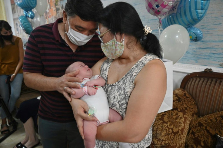 Joy for an Argentinian couple as they collect their son -- the surrogacy industry has exploded in Ukraine after India and Thailand outlawed commercial surrogacy