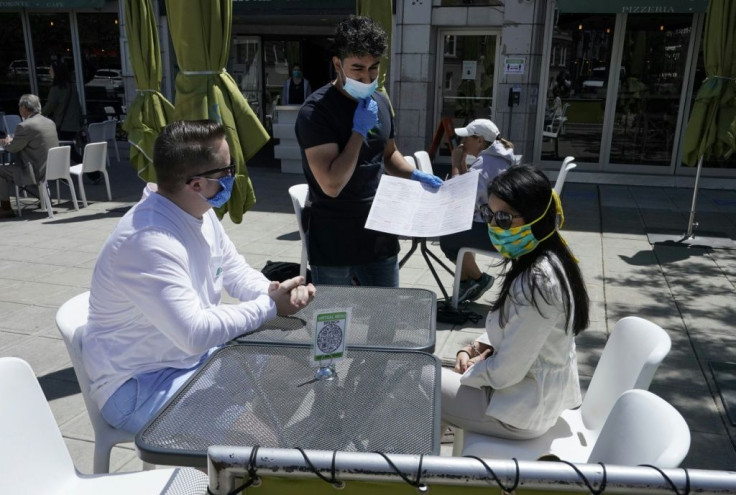 As coronavirus cases surge across the United States, it's too soon to tell if the improvement in consumer confidence will be sustained