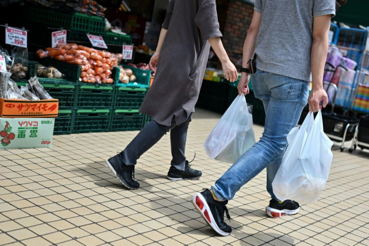 Shops, including Japan's ubiquitous convenience stores, can decide how much to charge customers for the bags