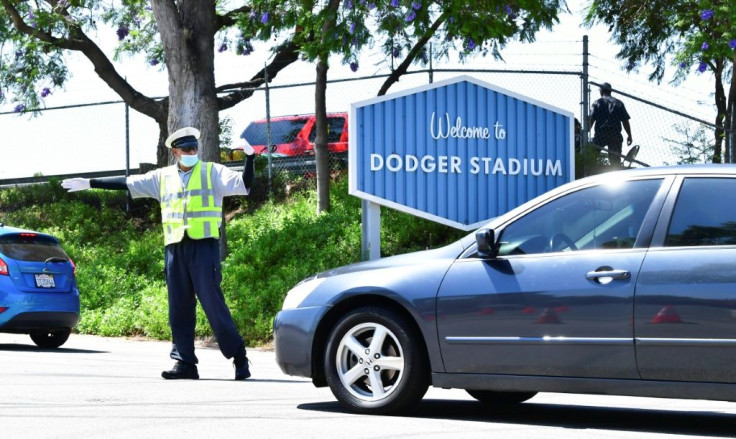 People arrive for COVID-19 testing at Dodger Stadium in Los Angeles, California