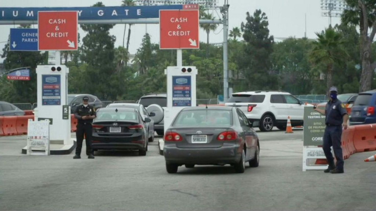 IMAGESIn Los Angeles, hundreds of cars arrive at a coronavirus testing center set up at Dodger Stadium, which usually hosts professional baseball games. This makeshift site conducts some 6,500 tests a day. Many beaches in the golden state, normally packed