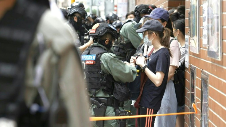 Hong Kong police arrested more than 300 people -- including ten under China's new national security law -- as thousands defied a ban on protests on the anniversary of the city's handover to China.