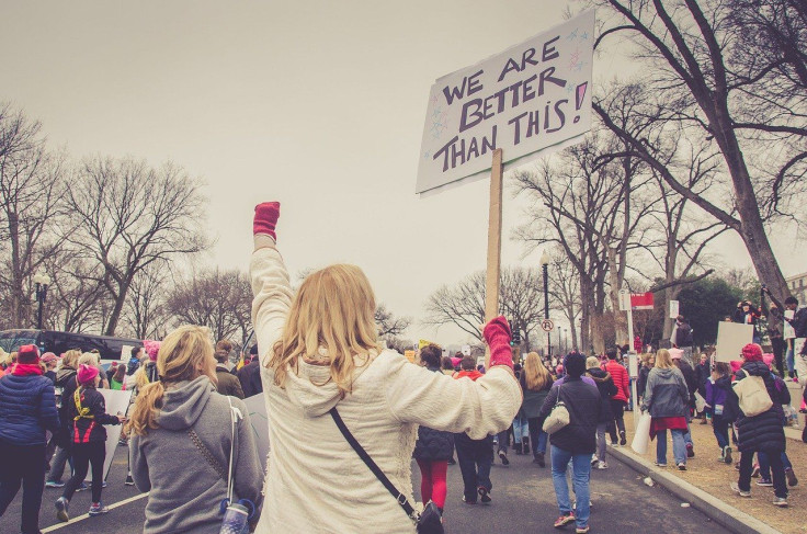 protesters with pitchforks protest in Hamptons estate