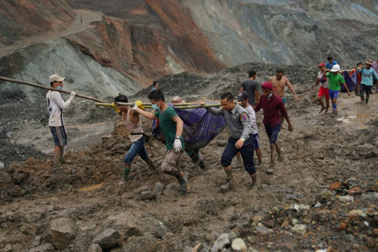 The disaster struck after heavy rainfall pounded the open-cast mines in Myanmar's north
