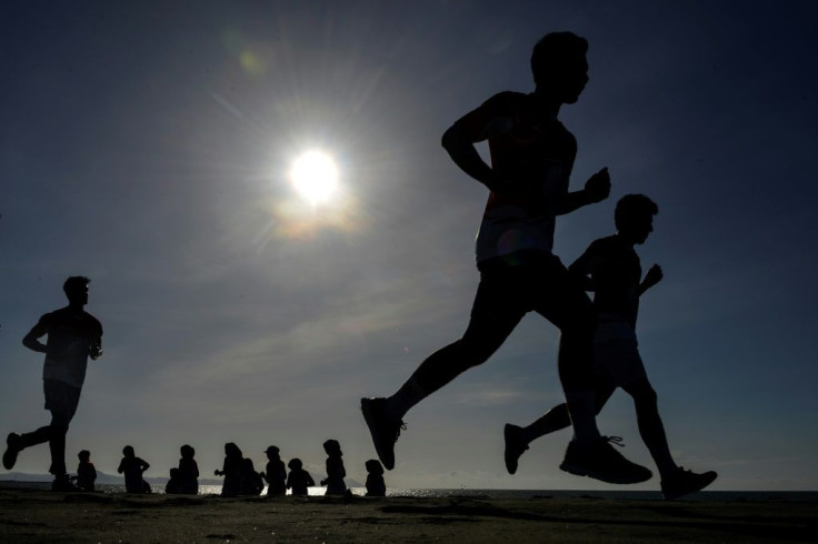 Rugby players train on a beach in Banda Aceh, Indonesia