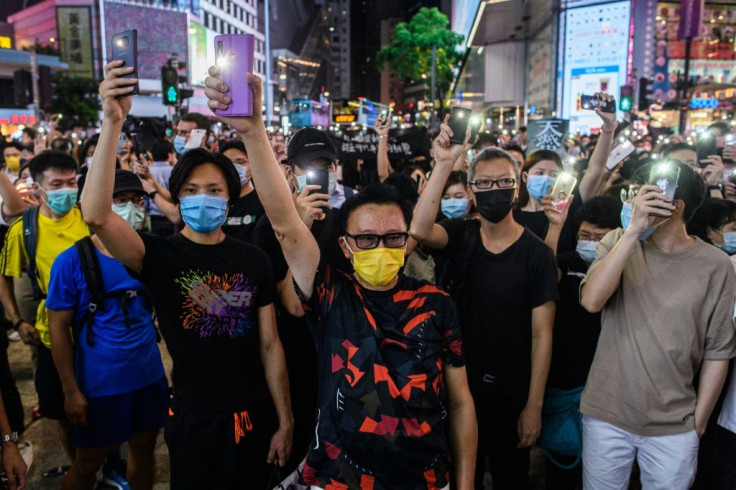 Beijing says it can now prosecute national security crimes committed outside it borders -- even by foreigners