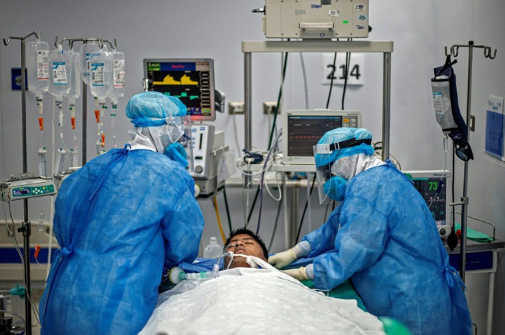 Nurses check the intubation of a COVID-19 patient in Lima, Peru, which has topped 10,000 deaths