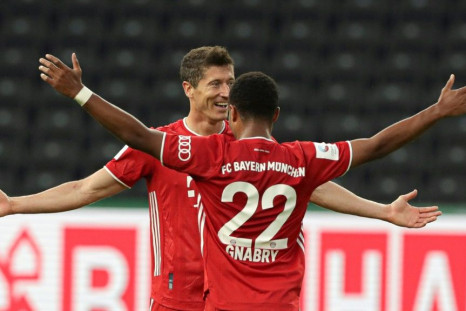 Bayern Munich striker Robert Lewandowski celebrates his long-range goal in the German Cup final win over Bayer Leverkusen on Saturday in Berlin.