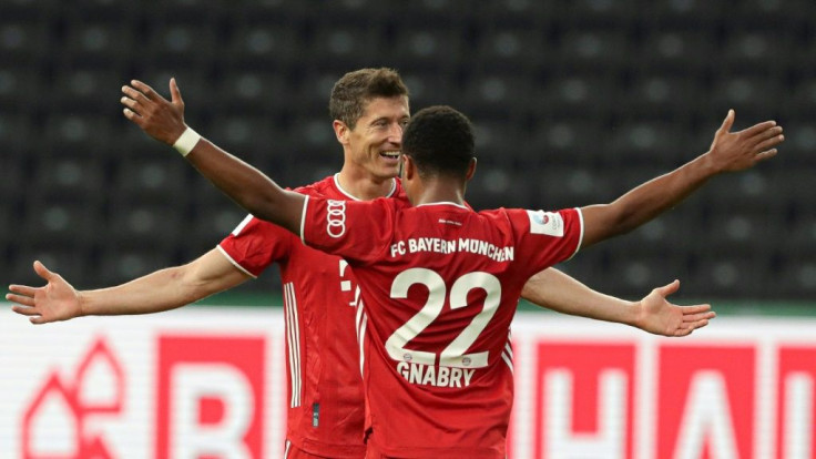 Bayern Munich striker Robert Lewandowski celebrates his long-range goal in the German Cup final win over Bayer Leverkusen on Saturday in Berlin.