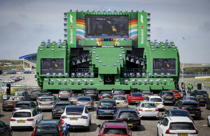 Hundred of racing fans watch the Austrian Formula One Grand Prix race at a drive-in cinema at the Zandvoort circuit, The Netherlands