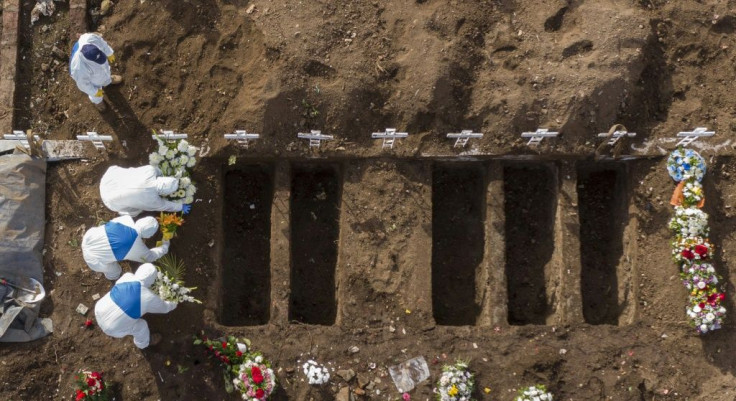 A COVID-19 victim is buried at the General Cemetery in Santiago, Chile