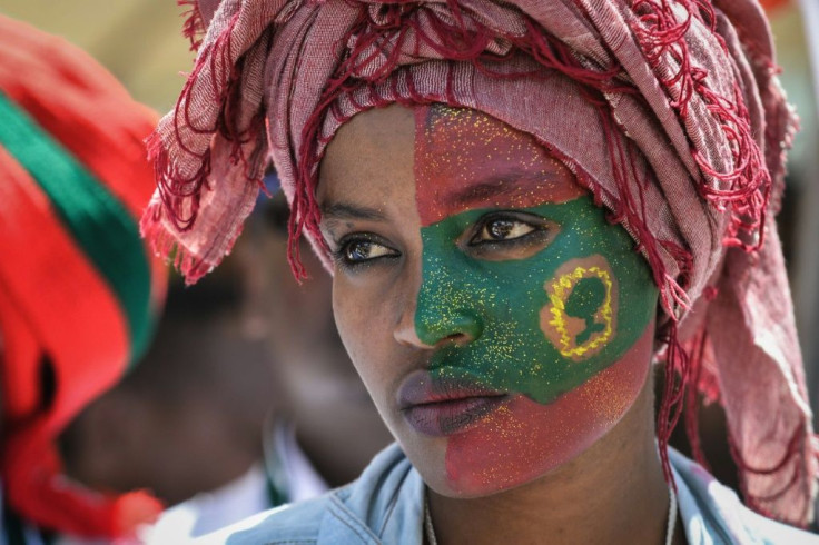 Follower: A woman's face is painted with the flag of the Oromo Liberation Front at celebrations in September 2018 to mark the return of the once-banned OLF to Addis Ababa
