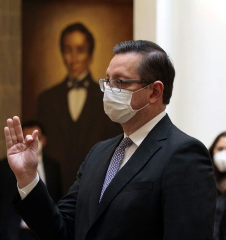 Bolivian former Senator Oscar Ortiz is sworn in as the new economy minister at the presidential palace in La Paz, on July 7, 2020