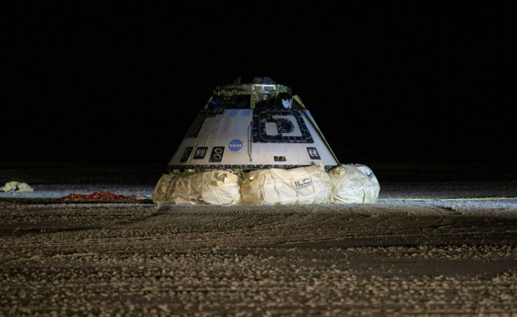 A Boeing Starliner capsule touches down in White Sands, New Mexico in December 2019 after an unsuccessful uncrewed test flight