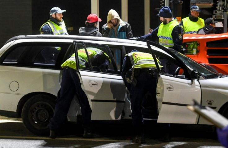 Police in the southern New South Wales border city of Albury check cars crossing the state border from Victoria