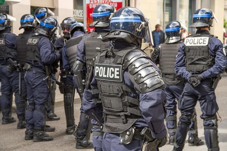 group-of-men-in-black-police-uniform