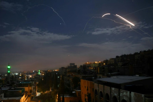Syrian air defences responding to what state media said were Israeli missiles targeting Damascus early last year, one of hundreds of reported such strikes