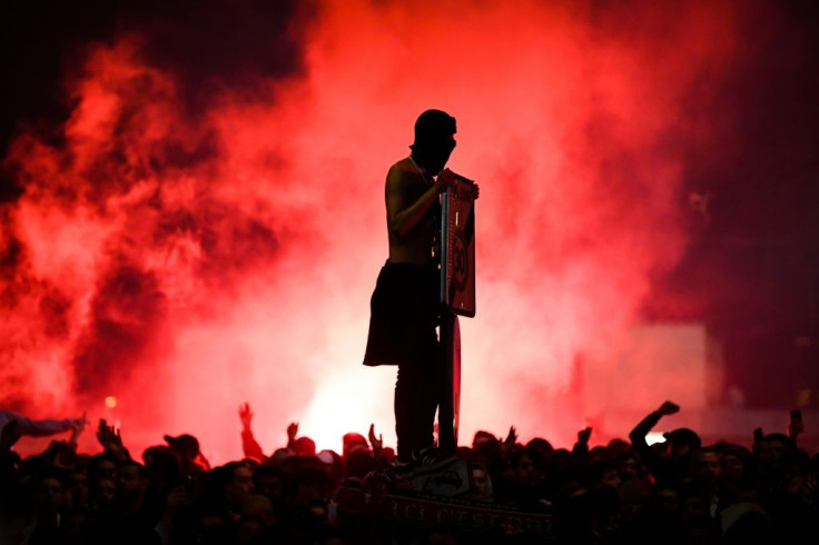 PSG supporters gathered outside the Parc des Princes to celebrate their team's win over Borussia Dortmund behind closed doors in March as the French club qualified for the last eight of the Champions League