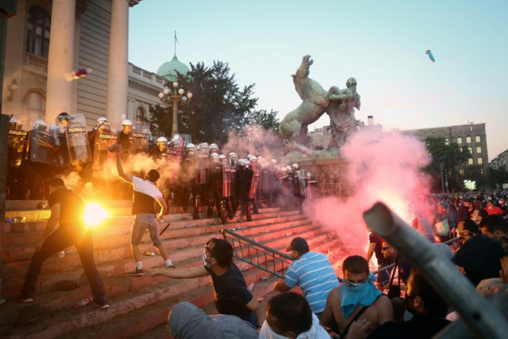 The Serbian capital Belgrade has been hit by clashes, with protesters outraged over the government's handling of the pandemic and the return of a round-the-clock weekend lockdown