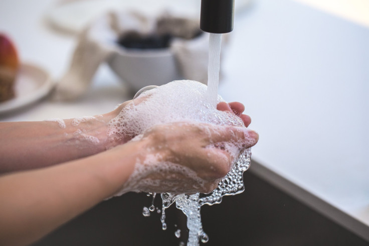 person-washing-his-hand-545014