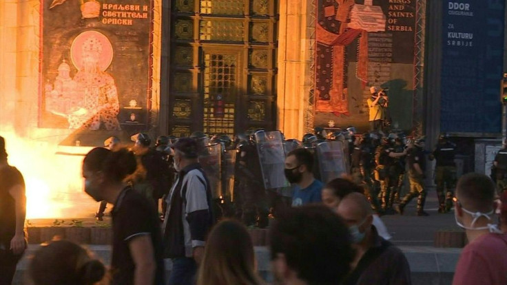 Protesters and police clash for a second night in the Serbian capital over the government's handling of the coronavirus pandemic.Clouds of tear gas and smoke filled the city centre in chaotic scenes that mirrored violence the night before, when thousan