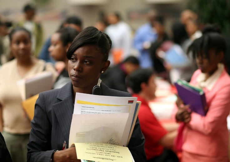 Job seekers wait to meet with a recruiter at a career fair in San Francisco -- pioneering US tech firms are under pressure to tackle lack of diversity