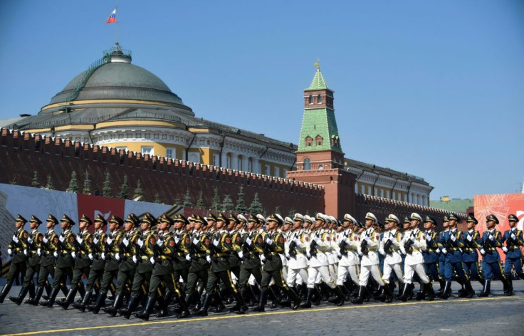 Soldiers from China's People's Liberation Army march on Red Square in Moscow during a June 2020 parade to mark the 75th anniversary of the Soviet victory over Nazi Germany, amid US pressure for both Russia and China to join nuclear arms talks