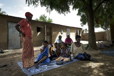 The family of Bakary Sangare, one of the latest victims, gathers in a Fana courtyard