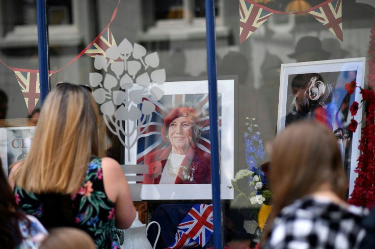 Crowds thronged Vera Lynn's former home of Ditchling in southeast England to catch a glimpse of her funeral cortege