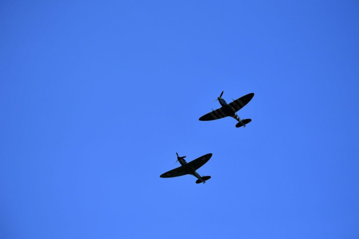 Crowds broke into applause as WWII Spitfire fighter planes performed a flypast