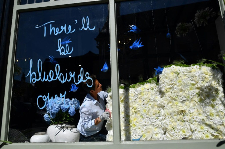 A line from one of the songs of World War II singer Vera Lynn is written on the window of a cafe in Ditchling