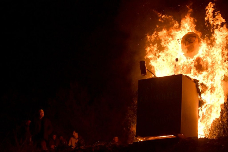 Bosnian Croats set fire to an effigy of the president of the International Criminal Tribunal for former Yugoslavia (ICTY)