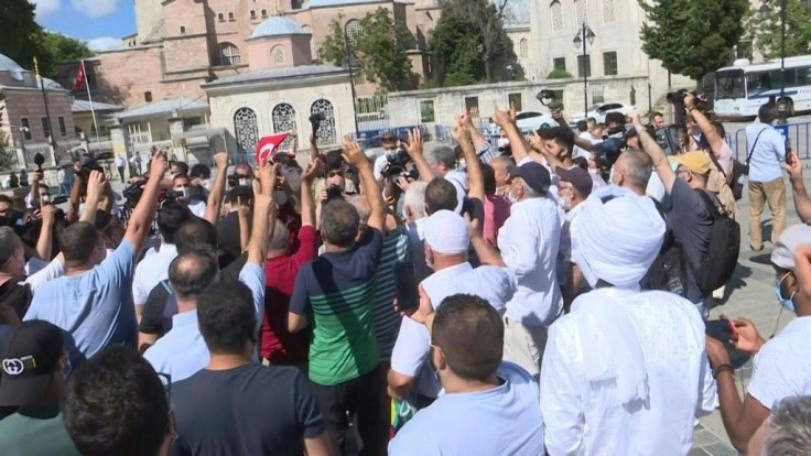 In Istanbul, people celebrate the decision of a top Turkish court to revoke the sixth-century Hagia Sophia's status as a museum, clearing the way for the Istanbul landmark to be turned back into a mosque in a move backed by President Recep Tayyip Erdogan.