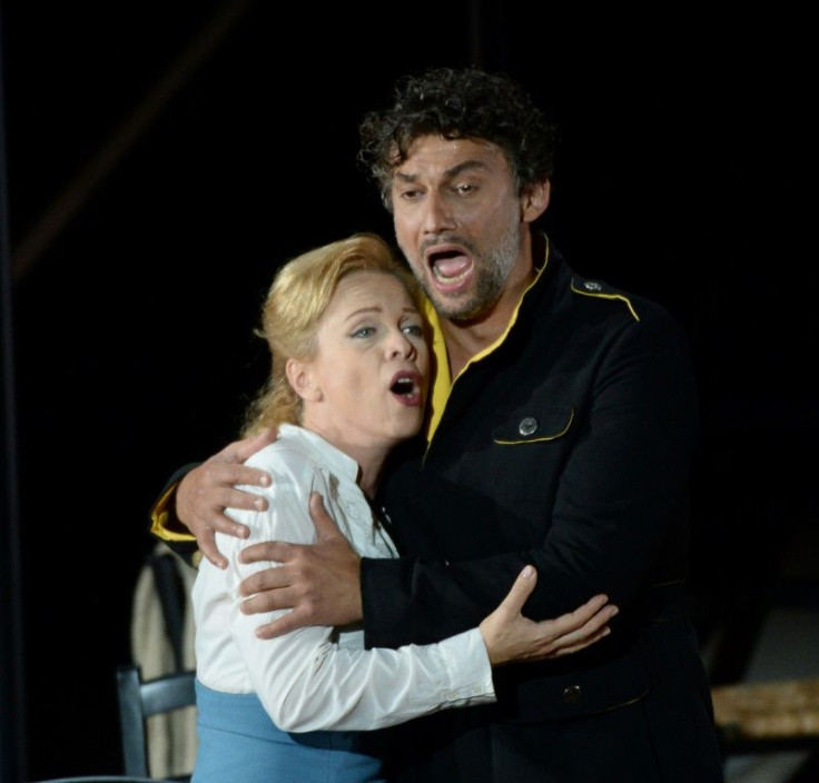 Tenor Jonas Kaufmann (R) as Don Jose and lyric soprano Inva Mula (L) as Micaela perform during a rehearsal of the opera "Carmen" by Georges Bizet on July 05, 2015