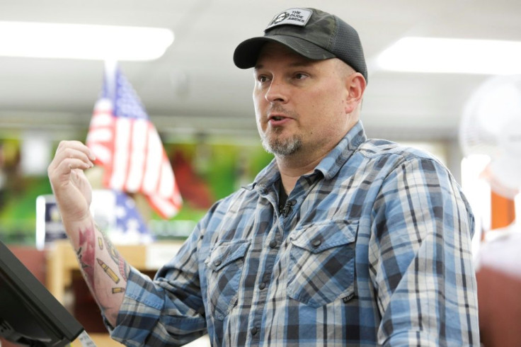 Tenino grocery store manager Chris Hamilton says the novelty of wooden money can bring tourists into town, where hopefully they will spend non-wooden money