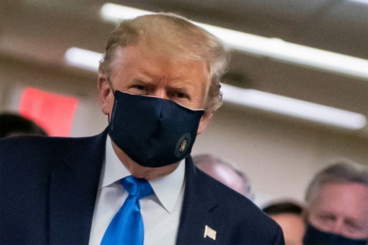 US President Donald Trump wears a mask as he visits Walter Reed National Military Medical Center in Bethesda, Maryland' on July 11, 2020