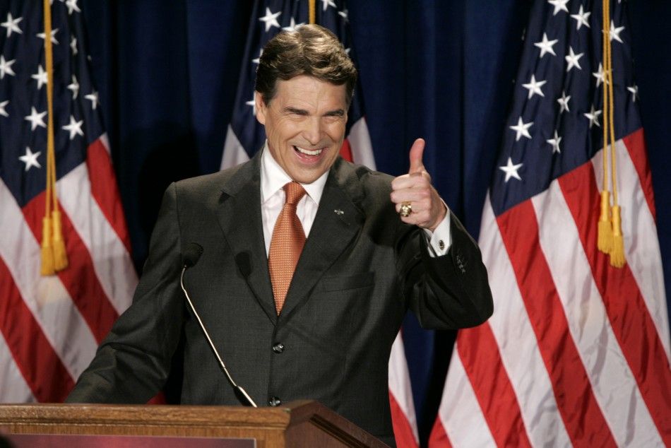Texas Governor Rick Perry gestures as he announces his presidential bid, in Charleston, South Carolina, August 13, 2011. 