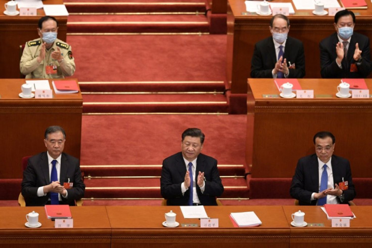 Xu Zhangrun was deeply critical of China's President Xi Jinping (centre)