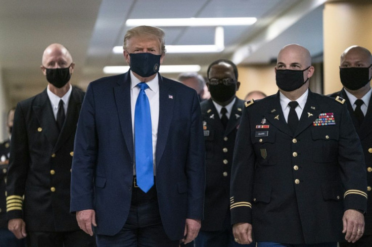 The man in the presidential mask: Donald Trump wore a face mask for the first time in public