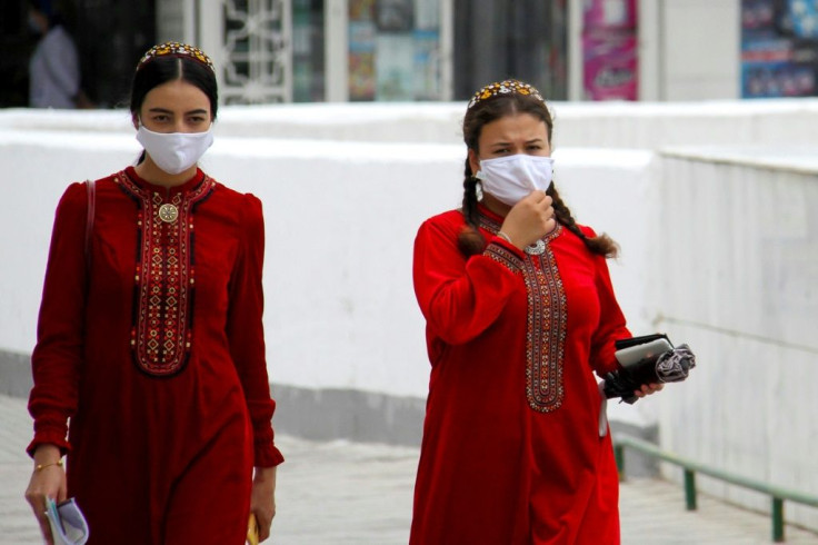 Women wearing masks in Turkmenistan, whose government insists the country is entirely coronavirus-free