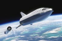 An artist's illustration of SpaceX's Starship spacecraft and Super Heavy rocket (collectively referred to as Starship) which the company says will one day carry both crew and cargo to Mars