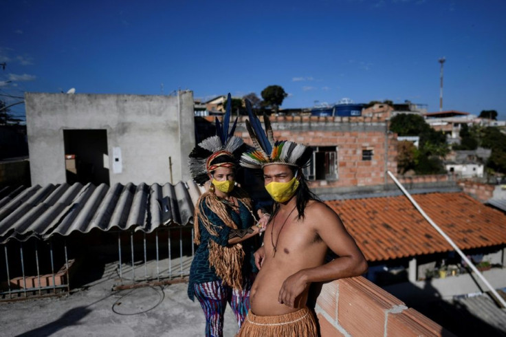 Angoho (L) and her husband Hayo, leader of the Pataxo Ha-ha-hae ethnic group