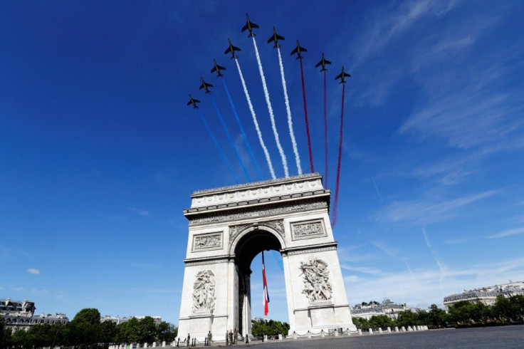 The French air force will still carry out its traditional flyover of the Arc de Triomphe and the Champs-Elysees