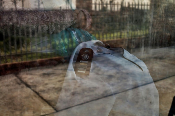 Confined: A South African nurse poses for a portrait at her home where she has been quarantined after testing positive for COVID-19