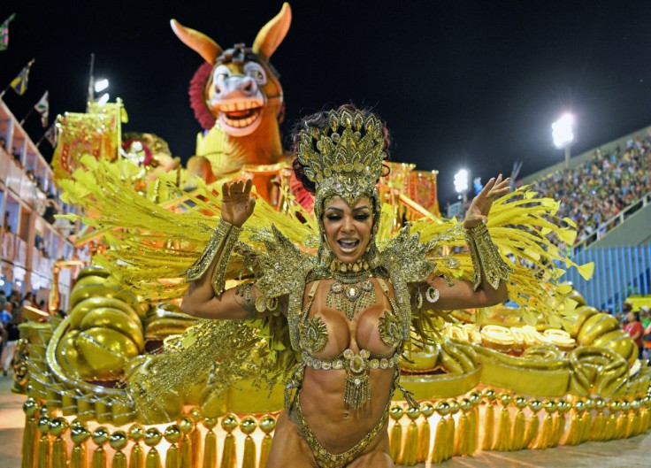 The sumptuous parades and monumental floats attract tens of thousands of tourists to Rio for the carnival every February
