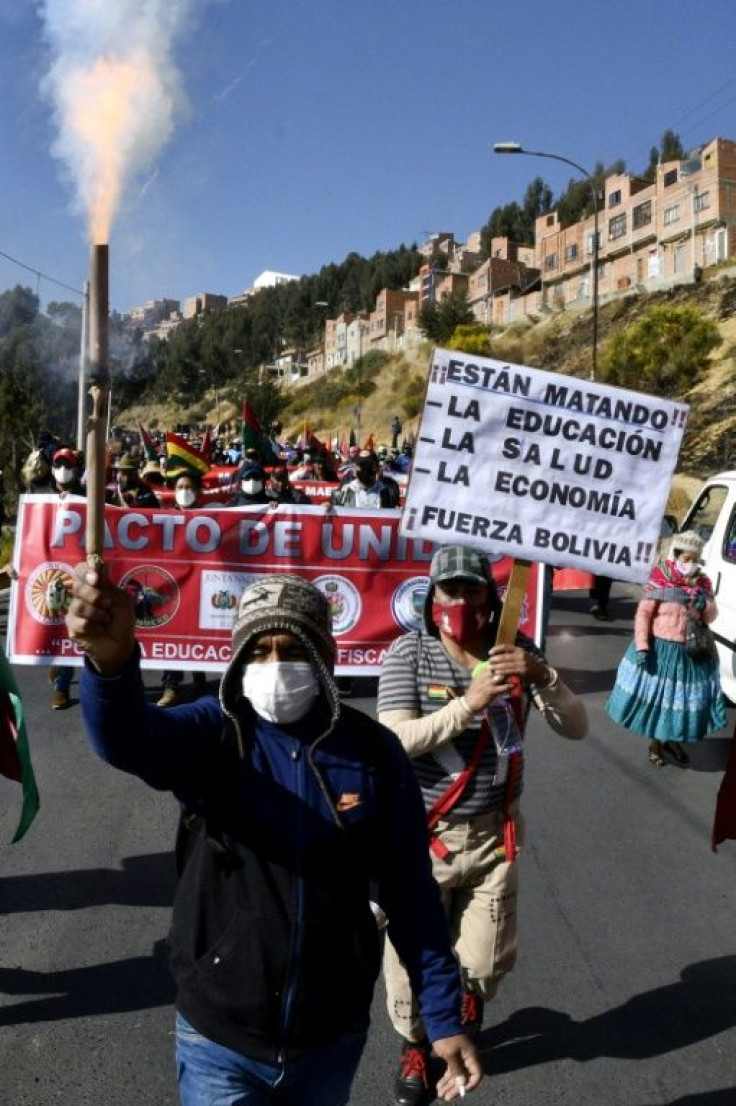 Protesters defying quarantine restrictions during a march against government policies from El Alto to La Paz, Bolivia