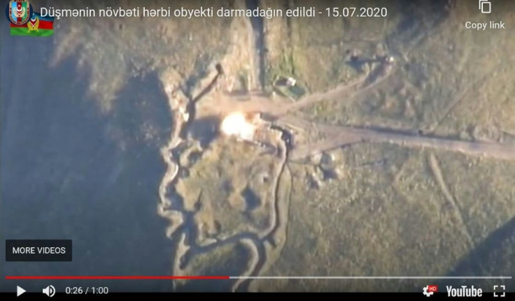 An image grab taken from a video uploaded on YouTube by the Azerbaijani Defence Ministry on July 15, 2020, allegedly shows an explosion targeting an Armenian army strong point on the Azerbaijani-Armenian border