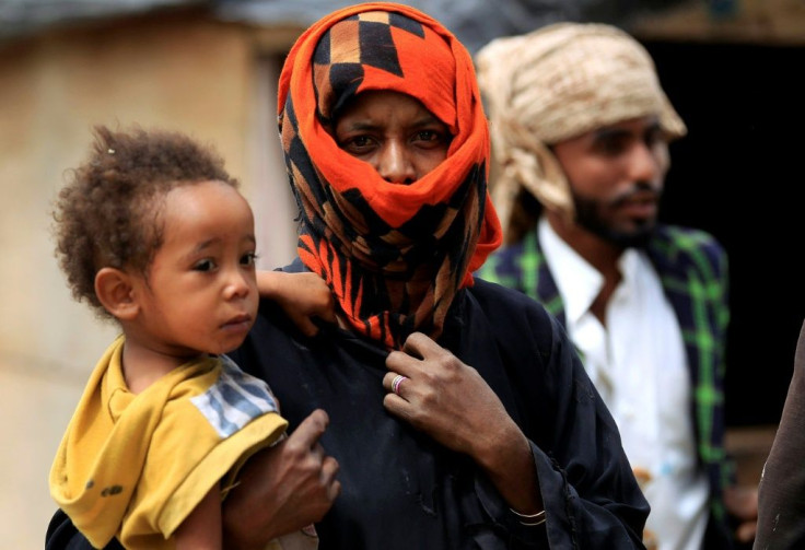 Members of Yemen's minority group known as "Muhamasheen" -- literally the "Marginalised" -- in a slum in the capital Sanaa