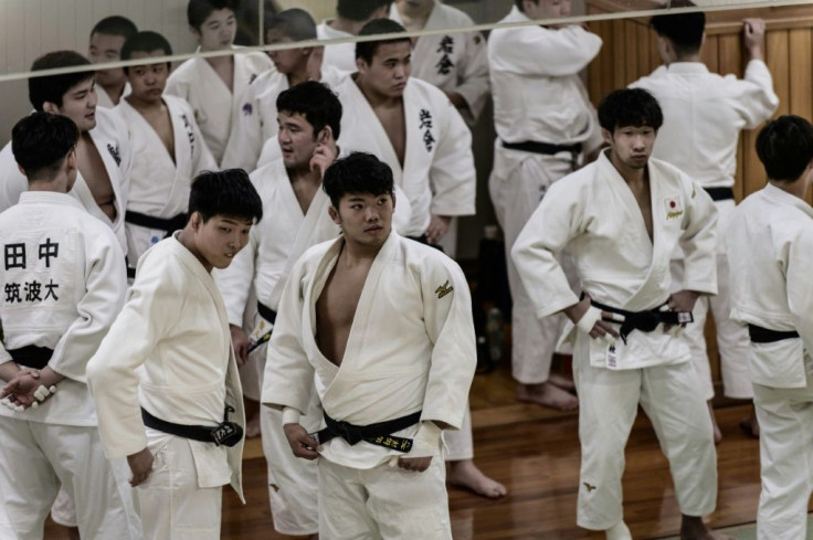 Judokas attend weekly freestyle practice sessions at the Kodokan